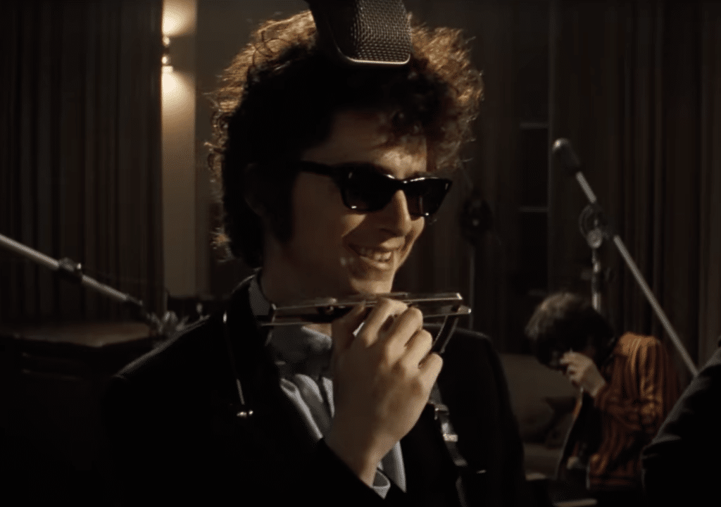 Timothée Chalamet as Bob Dylan in the musical biopic "A Complete Unknown" (2024).